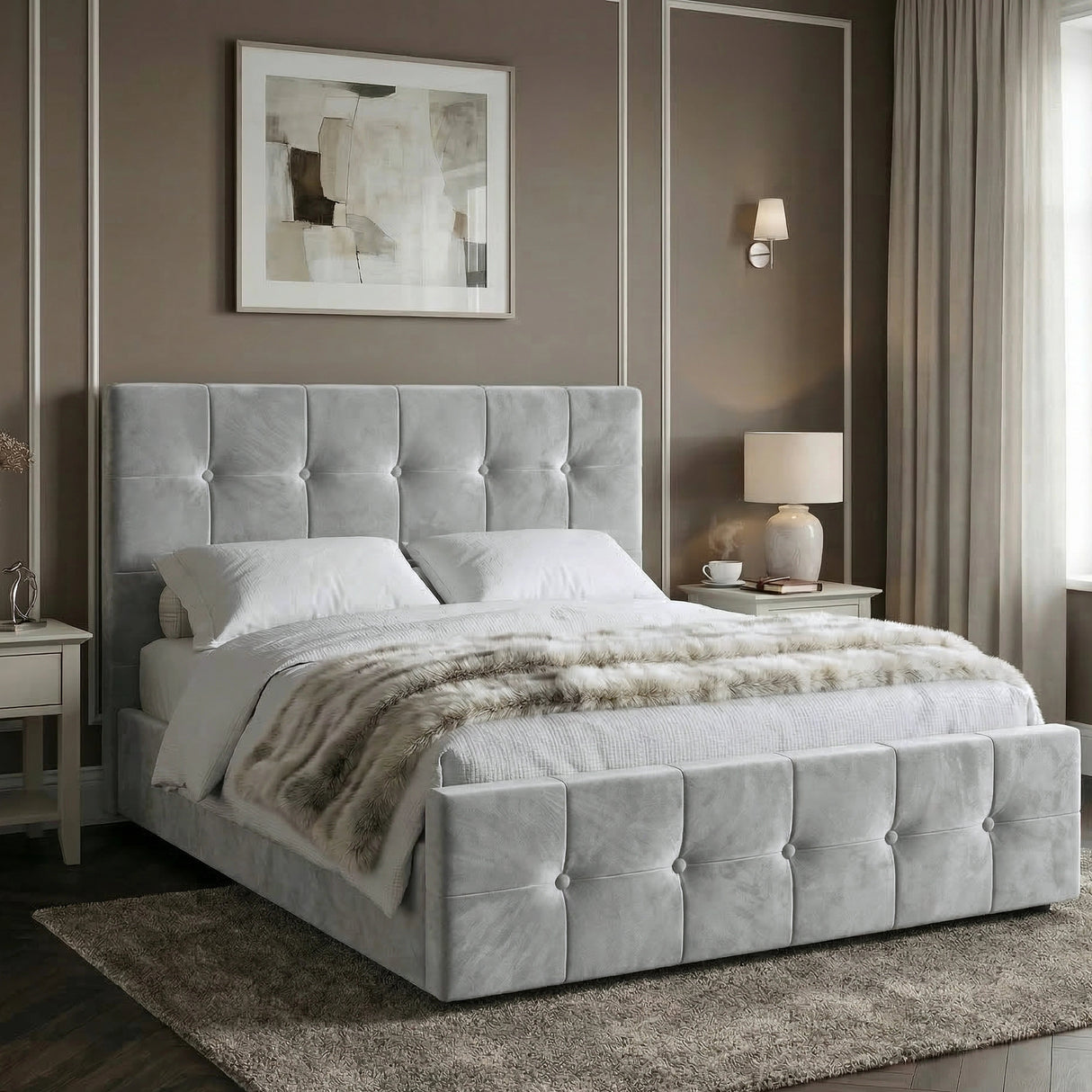 [Small Double | Grey] Side angle of tufted ottoman bed against taupe wall with white panel moulding and brass wall sconce