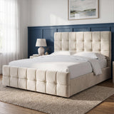 [King | Beige] upholstered bed frame with a tufted headboard and matching footboard, shown in a styled bedroom setting with white bedding, a beige throw blanket, marble nightstands, lamps, framed wall art, and a light rug.