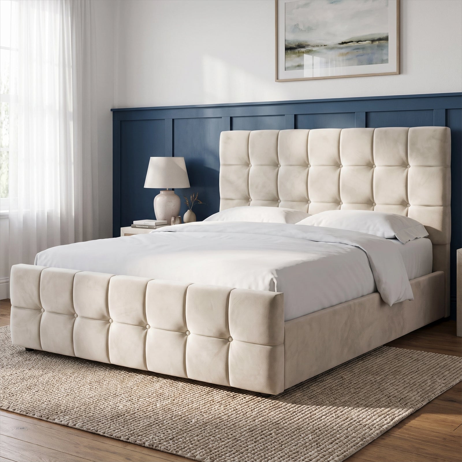 [King | Beige] upholstered bed frame with a tufted headboard and matching footboard, shown in a styled bedroom setting with white bedding, a beige throw blanket, marble nightstands, lamps, framed wall art, and a light rug.