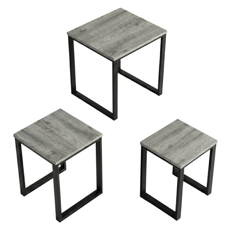 [Grey] Stackora set of 3 nesting tables angled 3/4 view on white background showing grey tops and metal frames