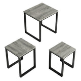 [Grey Wooden] Stackora set of 3 nesting tables angled 3/4 view on white background showing grey tops and metal frames