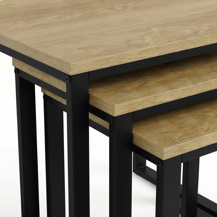 [Oak] Stackora set of 3 nesting tables angled 3/4 view on white background showing oak tops and metal frames