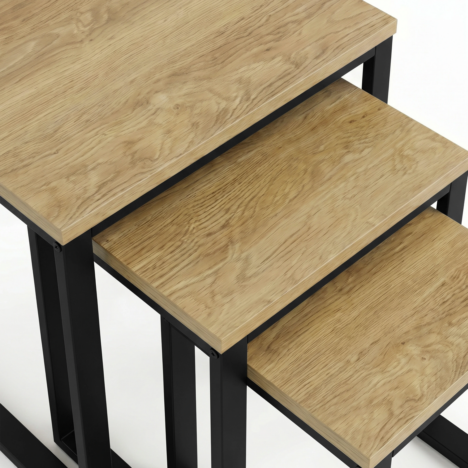 [Oak] Stackora nesting tables close-up of stepped oak effect tops showing wood grain and black metal frames