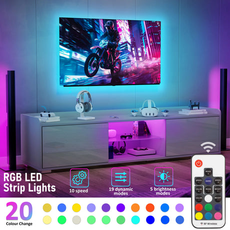 Gaming setup with RGB LED strip lights on a white entertainment console.