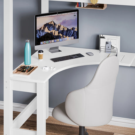 Space-saving corner workstation with neatly organised computer setup and a grey chair under the study bunk bed
