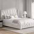 Modern bedroom with a stylish bed and matching nightstands.