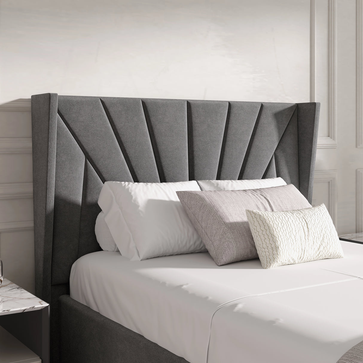 Detail of dark grey Sunrise-style headboard on single Velvet Ottoman Bed, featuring soft vertical panels for a modern touch.
