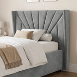 [Small Double | Grey] upholstered storage bed with a raised footboard and matching headboard, shown in a styled bedroom with white bedding