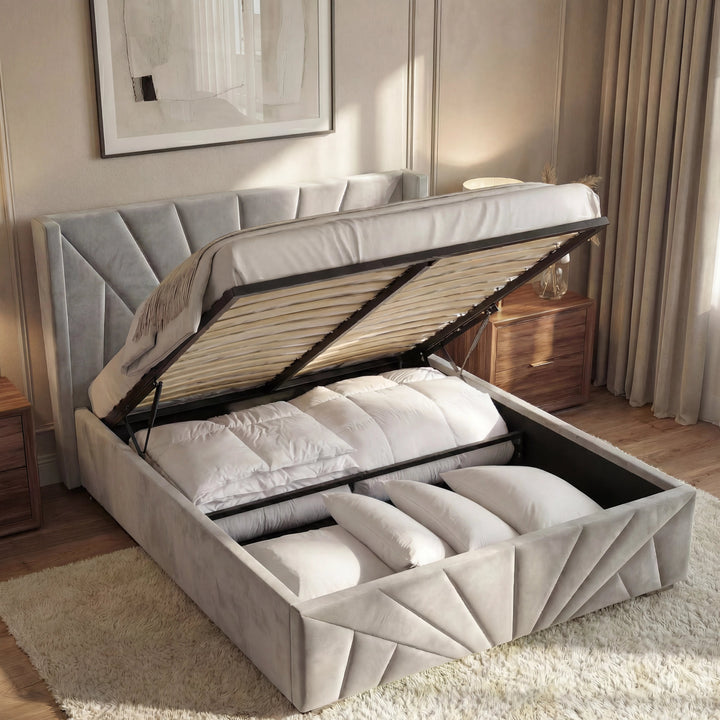 [Double | Grey] Double sunrise ottoman bed with gas-lift raised showing storage with duvets and pillows in warm room