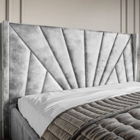 Crushed Velvet Ottoman Storage Bed Silver with Sunrise headboard design. Elegant platform bed frame with end lift-up storage in luxurious silver finish.