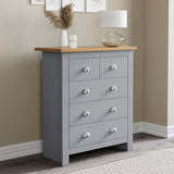 Tall bedside chest of drawers with top side flower pots, stylish and functional bedroom storage.