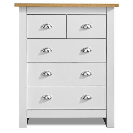 Tall wide chest of drawers – spacious storage with lamp and flower pot on top.