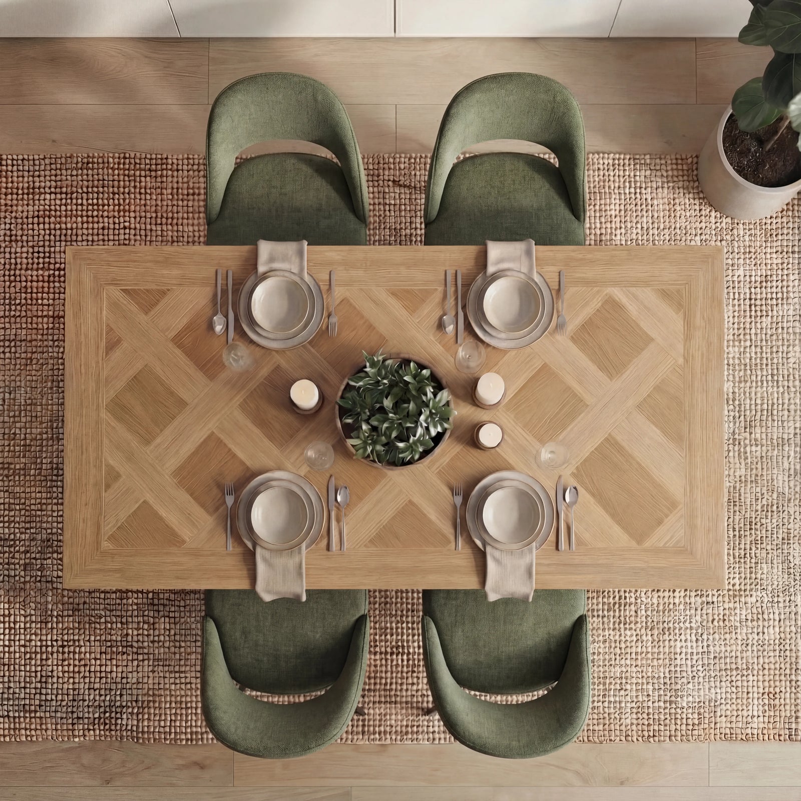 [4 Seater | Green] Top-down view of Aldridge oak parquet table with 4 green scoop chairs and green plant centerpiece.