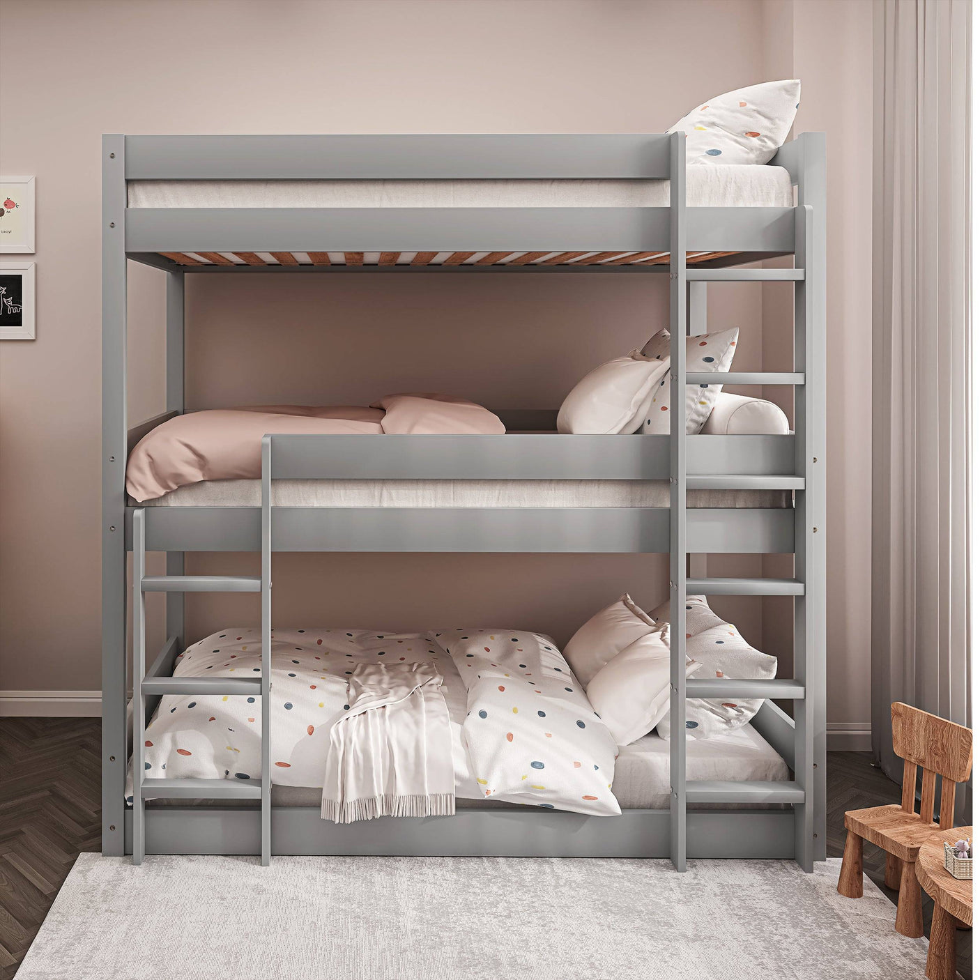 Front view of grey triple bunk bed with safety rails and ladders, designed for children and teens.