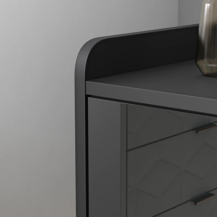[Black] Close-up of black gloss TV unit top corner showing rounded edge and diamond door pattern
