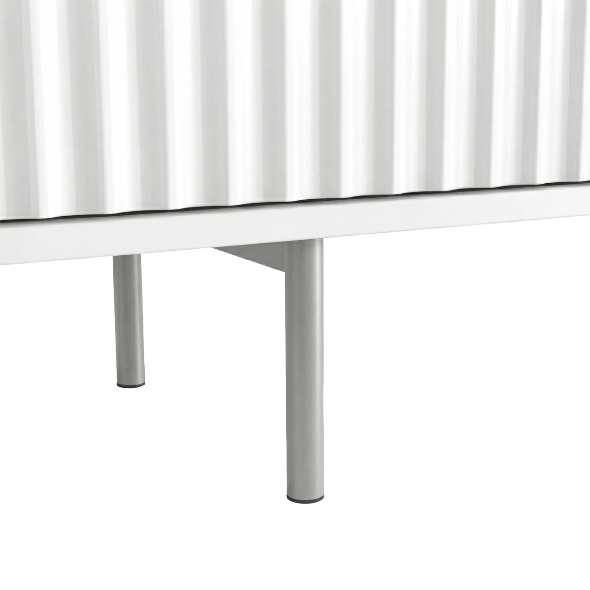 Elevated white TV unit with slim silver metal legs and textured fluted doors for a modern, airy interior design.