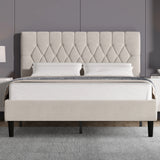 Beige velvet bed frame double size with tall adjustable chesterfield headboard and black wooden legs, ideal for modern UK bedrooms.