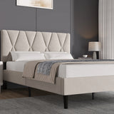 Beige upholstered bed with tufted headboard in a bedroom setting.