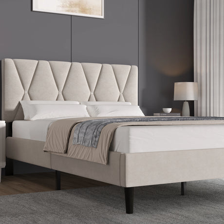 Beige upholstered bed with tufted headboard in a bedroom setting.