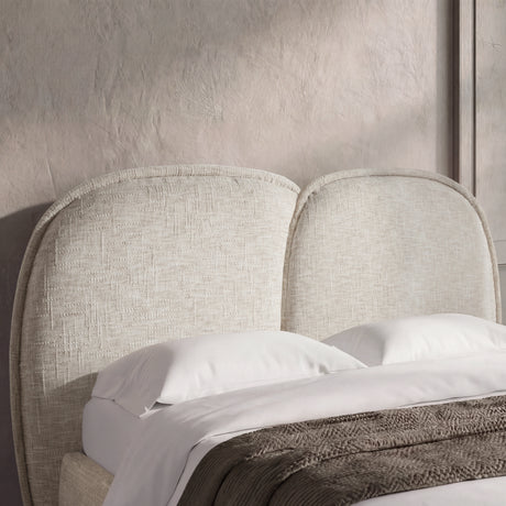 [Double | Beige] Upholstered beige double bed frame with a soft padded headboard close up in a natural light room setting