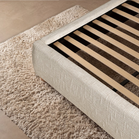 [King | Beige] Upholstered beige king bed frame with a soft padded headboard, wooden  round feet and wooden slats for mattress support