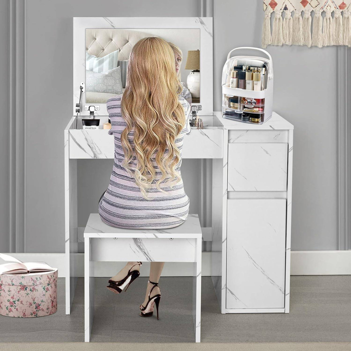 Small dressing table with flip-up mirror and stool in white marble finish, featuring built-in storage and a compact vanity makeup desk design.