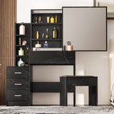 Black dressing table with storage, drawers, and large mirror in marble finish. Includes open shelves and matching cushioned stool for bedroom use.