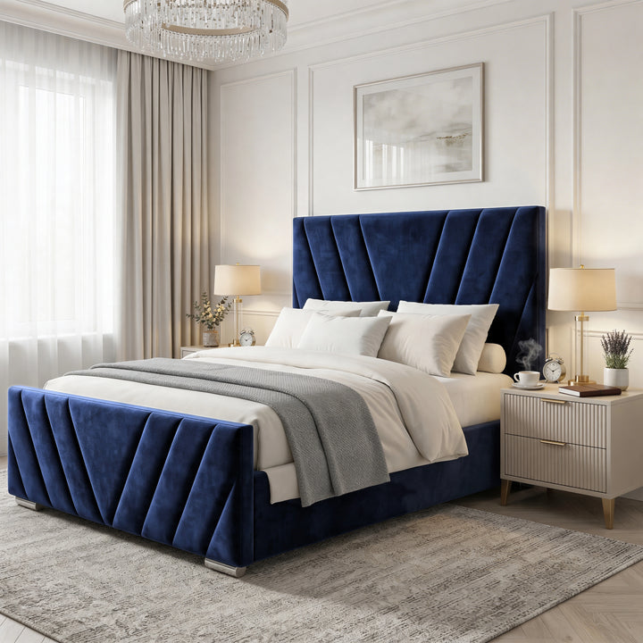 [Double | Blue] Wide angle of velvet ottoman bed with chevron-stitched panels in styled bedroom with nightstands