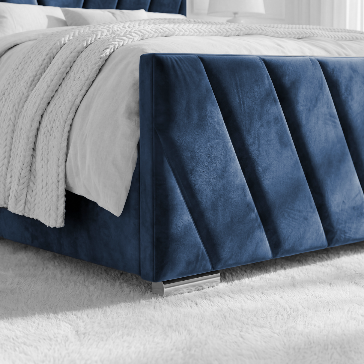 Close-up of the side of the velvet blue king bed frame, highlighting its rich texture and sophisticated style