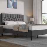 [King | Grey] Side angle of velvet bed with chesterfield button-tufted headboard and tapered black legs