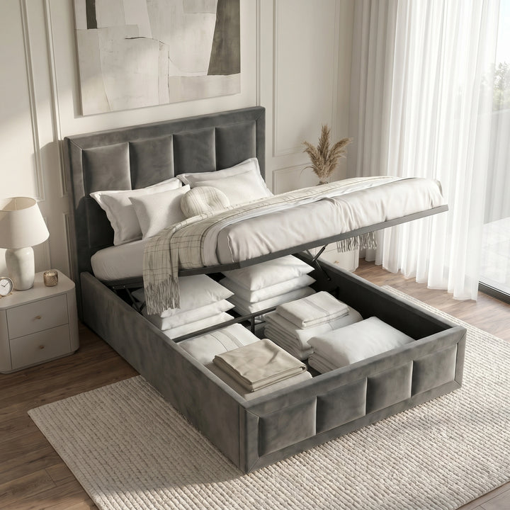 [Single | Grey] Velvet end lift ottoman bed open, exposing under-bed storage filled with pillows, sheets and throws