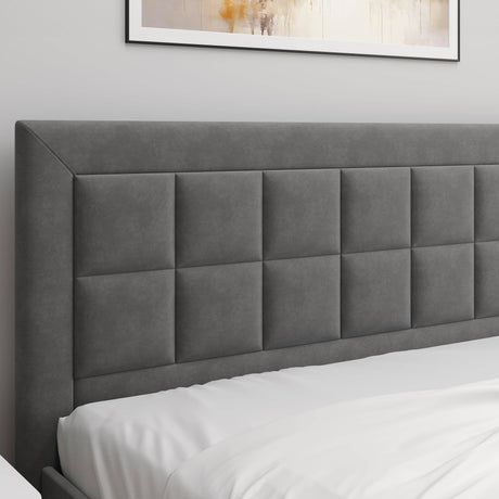 Grey ottoman bed with high headboard, offering style and hidden storage.