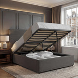 [King | Grey] Velvet ottoman bed base tilted up, king size, storage cavity full of bedding against panelling