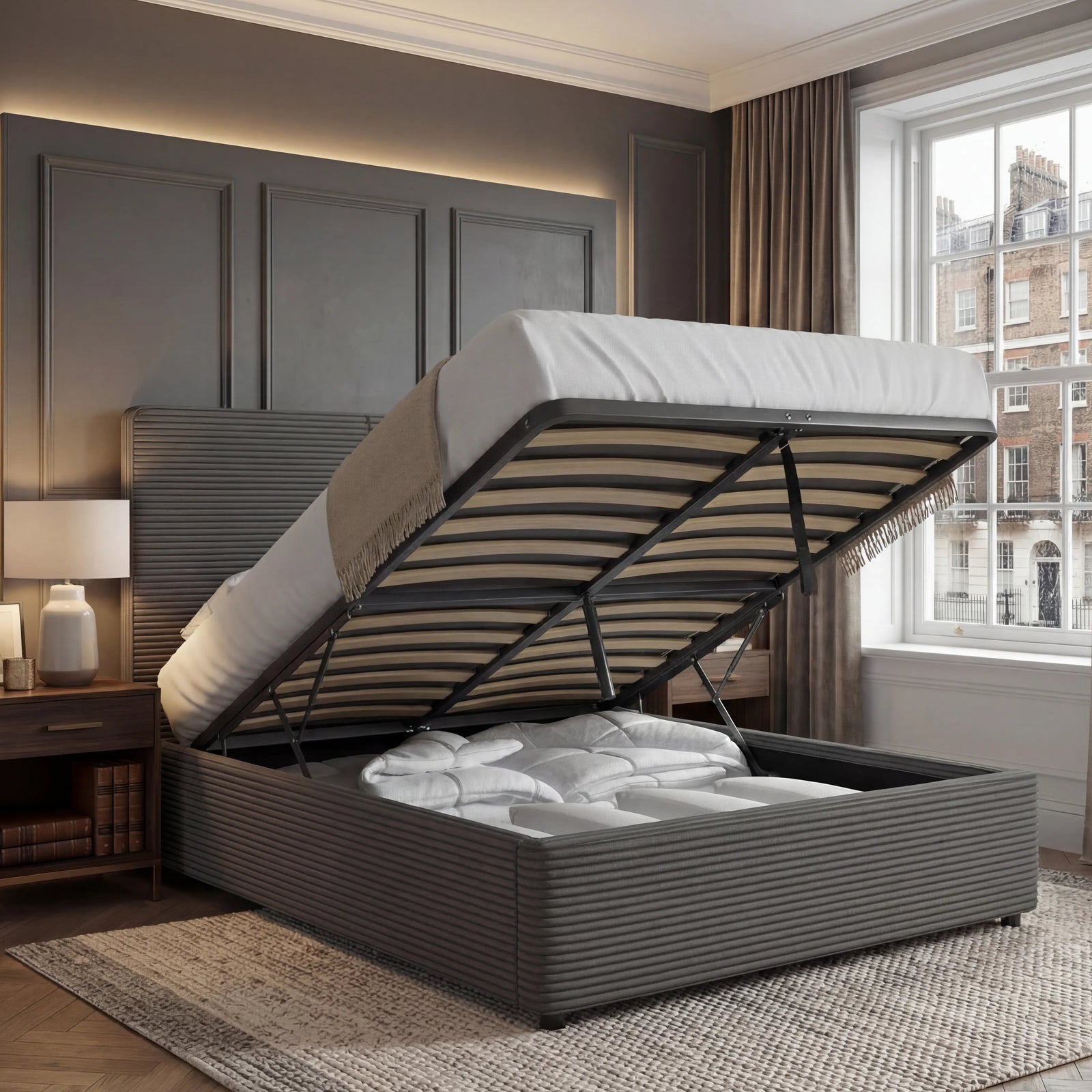 [King | Grey] Velvet ottoman bed base tilted up, king size, storage cavity full of bedding against panelling