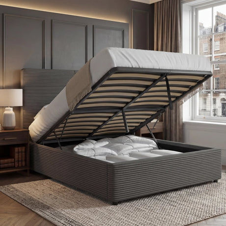 [Single | Grey] Single velvet ottoman bed lifted open, slatted base raised to reveal bedding stored in the base