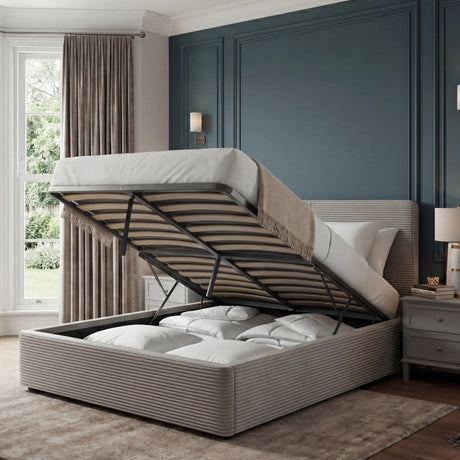 [Single | Light Grey] Single velvet ottoman bed lifted open, slatted base raised on gas struts with bedding stored inside