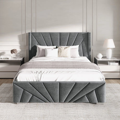 Gray upholstered bed with decorative headboard in a bedroom setting.