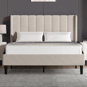 [Double | Beige] Front view of velvet bed with vertical channel-tufted winged headboard and tapered dark legs
