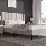 [King | Beige] Side angle of velvet bed with vertical channel-tufted headboard and low footboard on dark legs