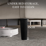 [King | Beige] Low-angle showing space underneath velvet bed frame with tapered dark legs for vacuum access