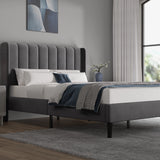 [King | Grey] Upholstered bed from the side showing fluted headboard profile and styled neutral bedding