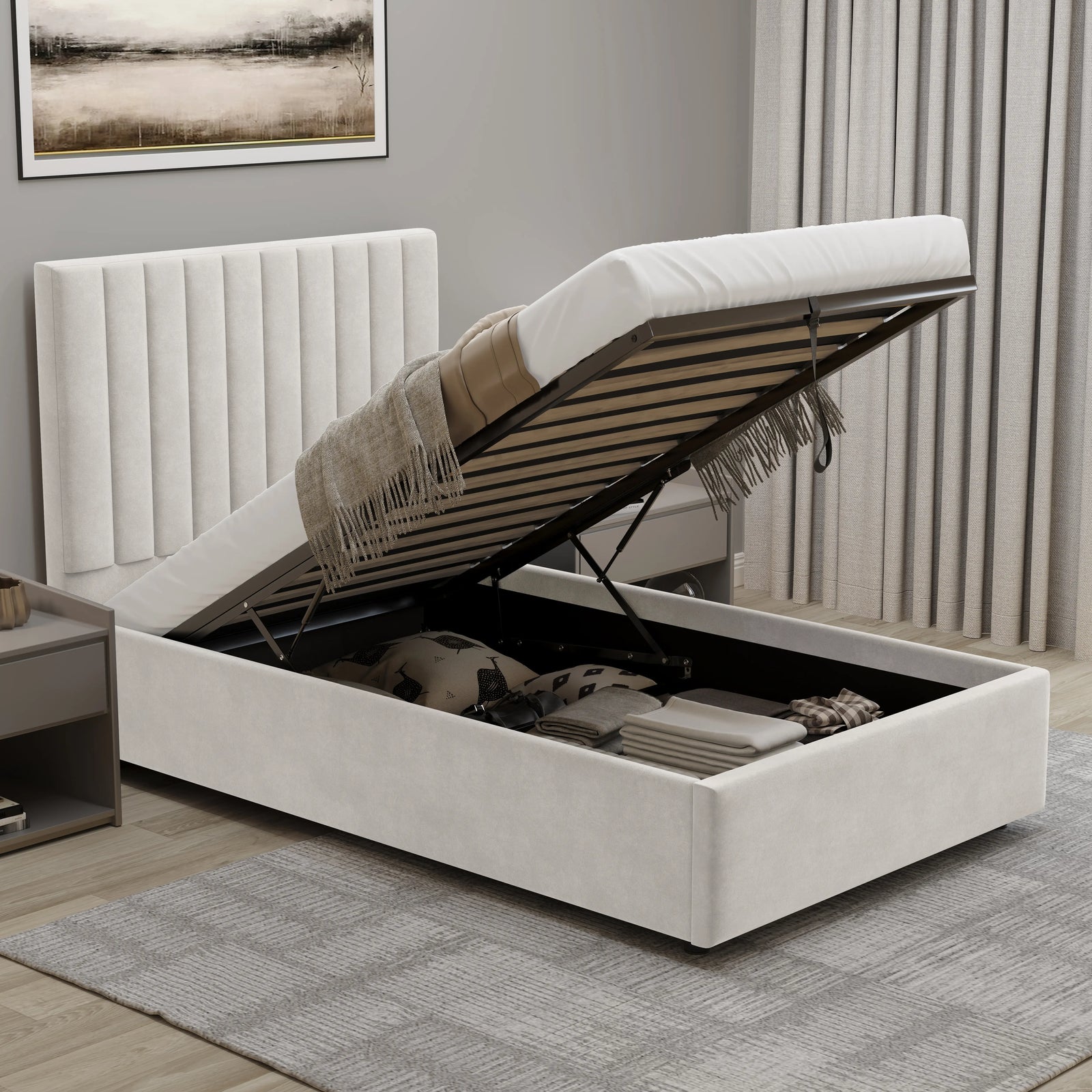 [Beige | Single] velvet ottoman bed with gas-lift raised showing organised storage with folded linens and pillows