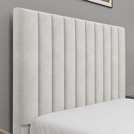 [Beige | Single] bed frame headboard close-up displaying vertical pleats with books and decorative objects on nightstand