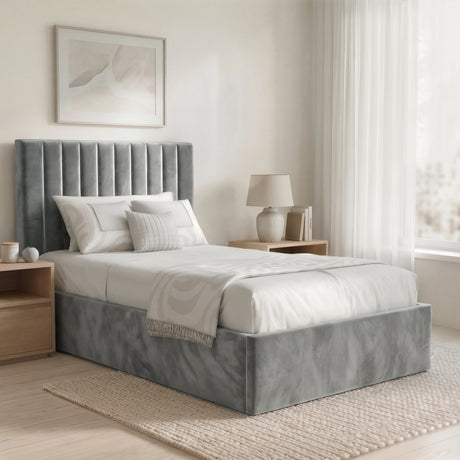 [Grey | Single] velvet bed with vertical channel tufting styled in light modern room with abstract leaf artwork