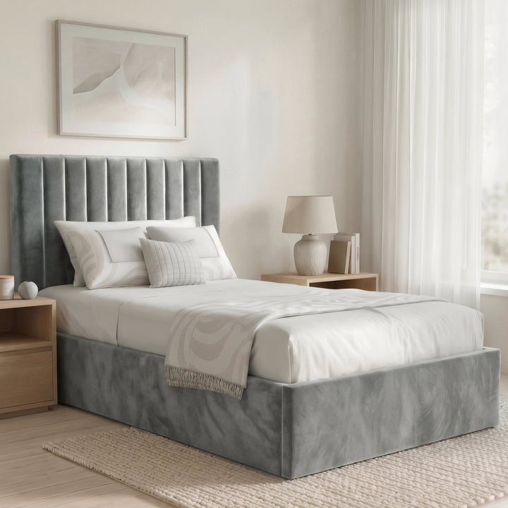 [Grey | Single] Vertical channel velvet ottoman bed styled with white bedding and tassel throw under leaf print art