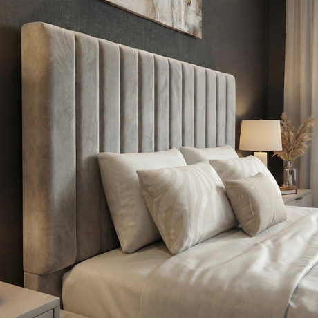 [Light Grey | Small Double] Vertical channel velvet ottoman bed in bedroom with dark accent wall and abstract art above bed