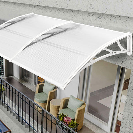 Victorian style door canopy in white, elegant and weather-resistant design.