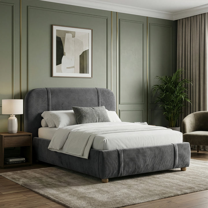 [Double | Dark Grey] Side angle of fabric bed with curved wingback headboard in sage green panelled room with gold trim