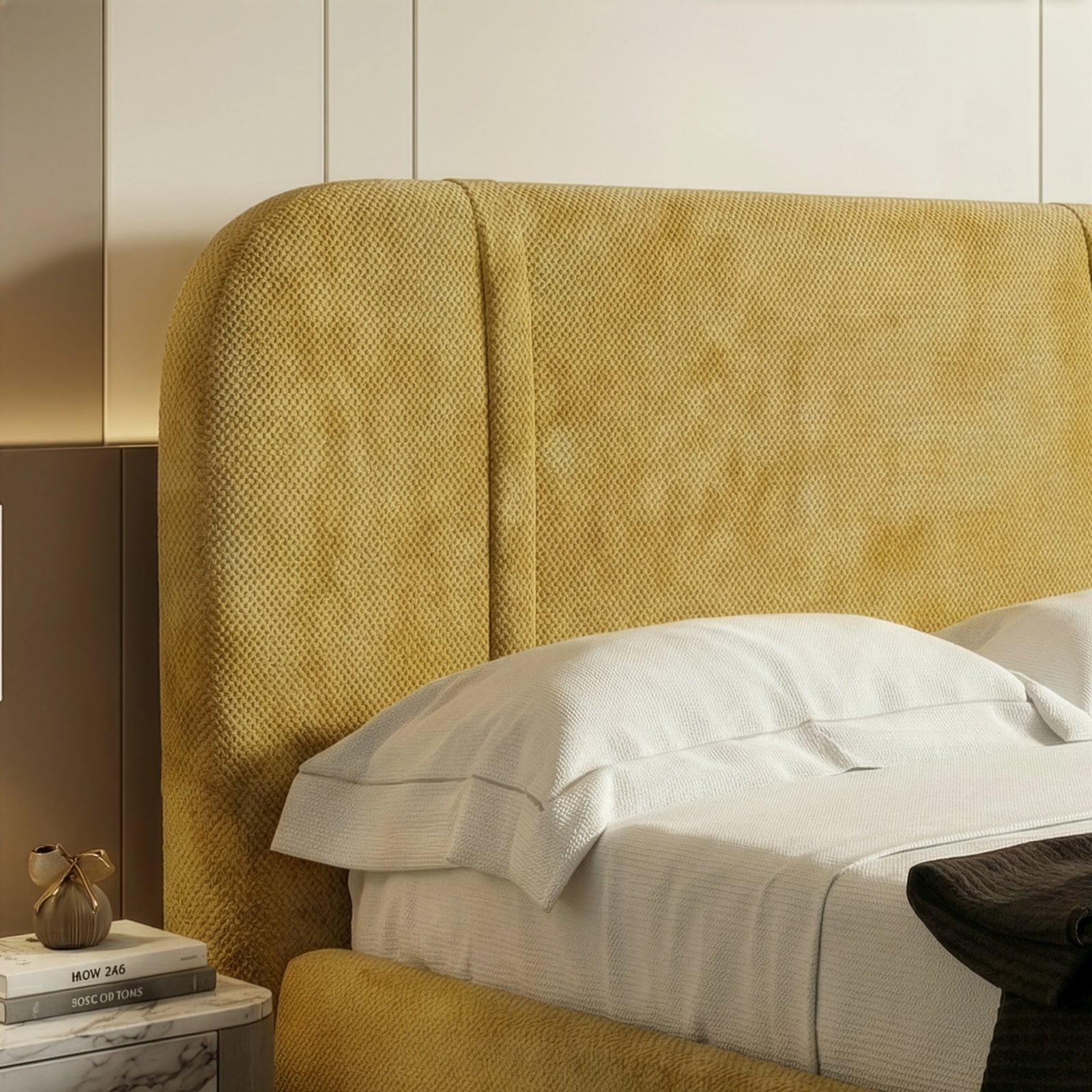[King | Yellow] Headboard detail with ochre upholstery and curved edge against LED-lit panelled wall