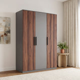 [Walnut] Angled room view of a closed three door wardrobe with grey centre panels, black handles, and side table